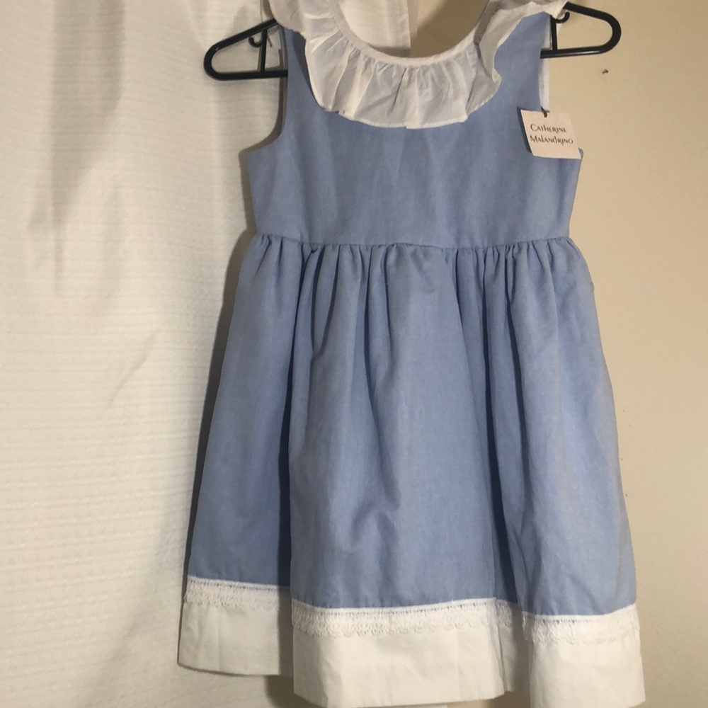 Girl dress, blue color, new never use. Size 7.